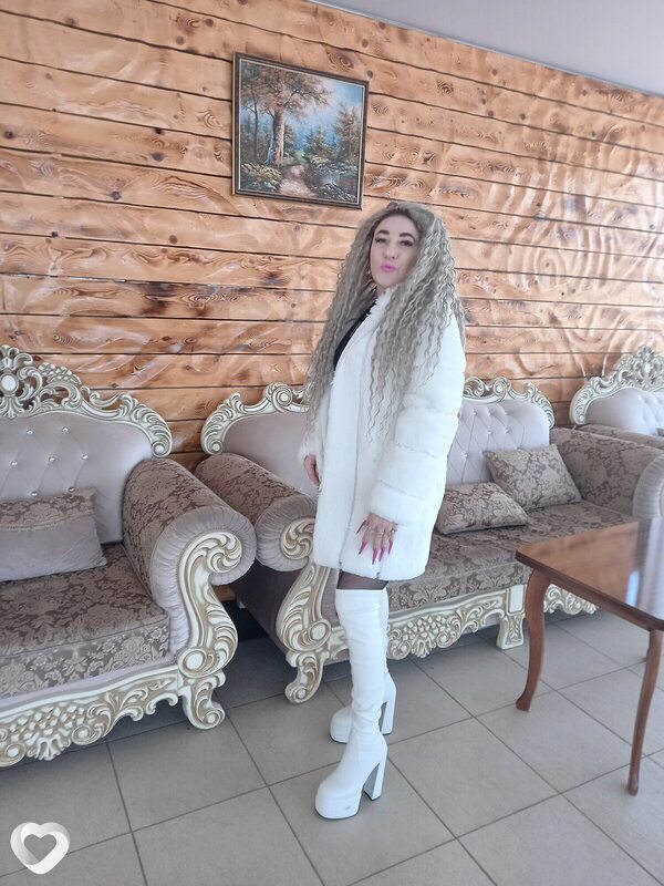 Мила