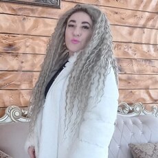 Мила