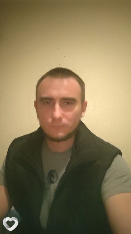 Николай