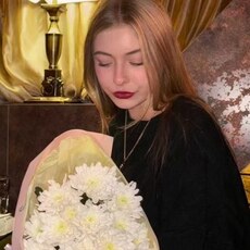 Мила