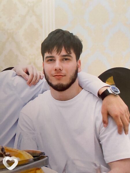 Николай