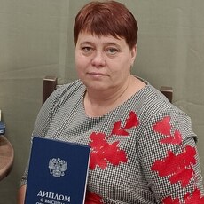 Оля
