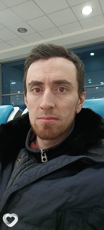 Николай