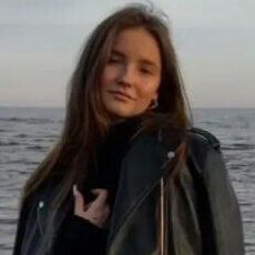 Мила