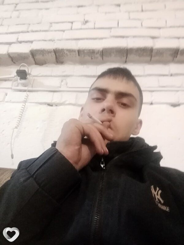 Николай