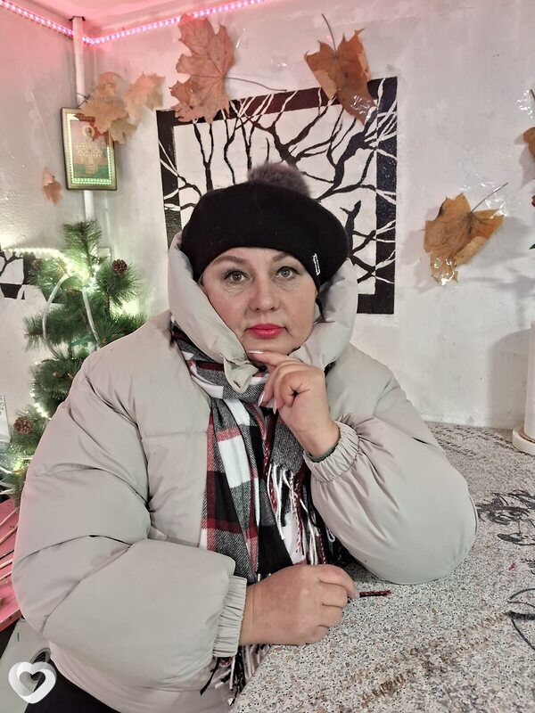 Мила