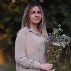 Мила