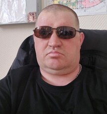 Николай