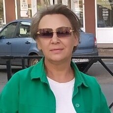 Мила
