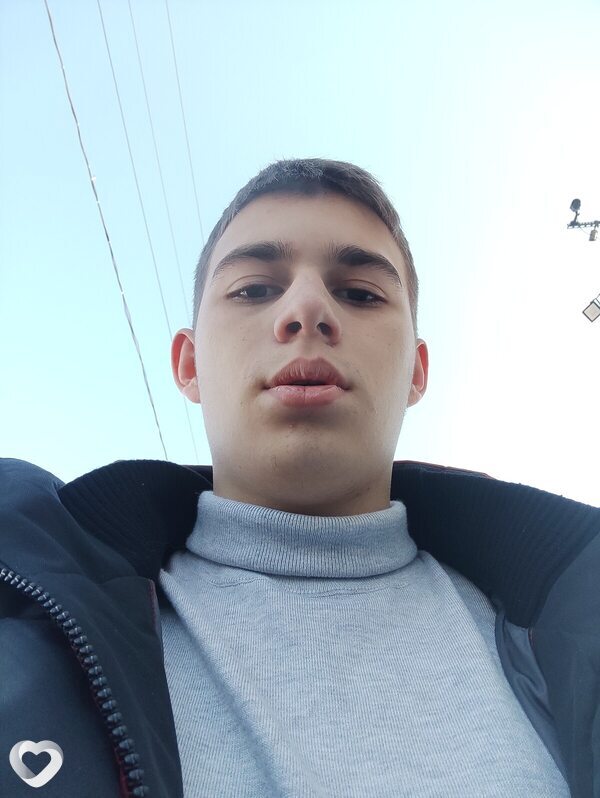 Николай