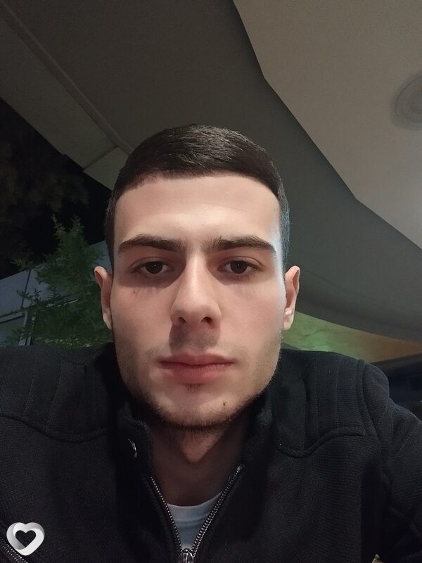 Николай