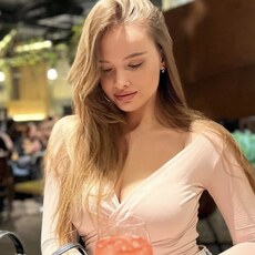 Мила
