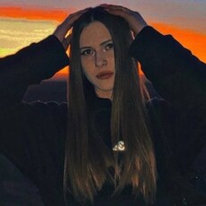 Мила