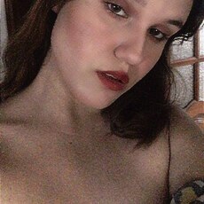 Мила