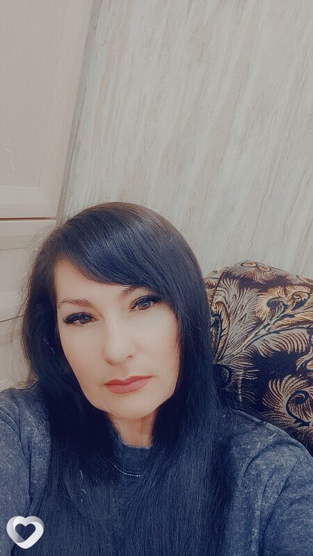 Мила