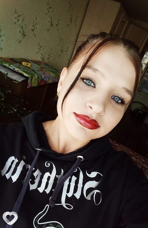 Оля